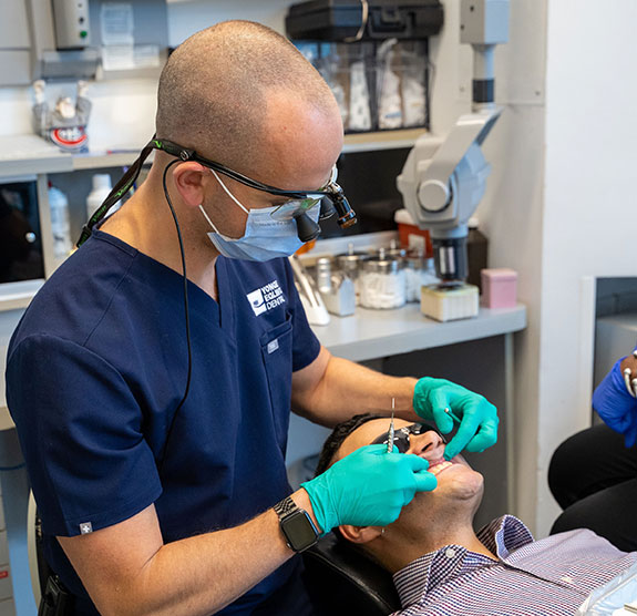Dentist examining patient's oral health
