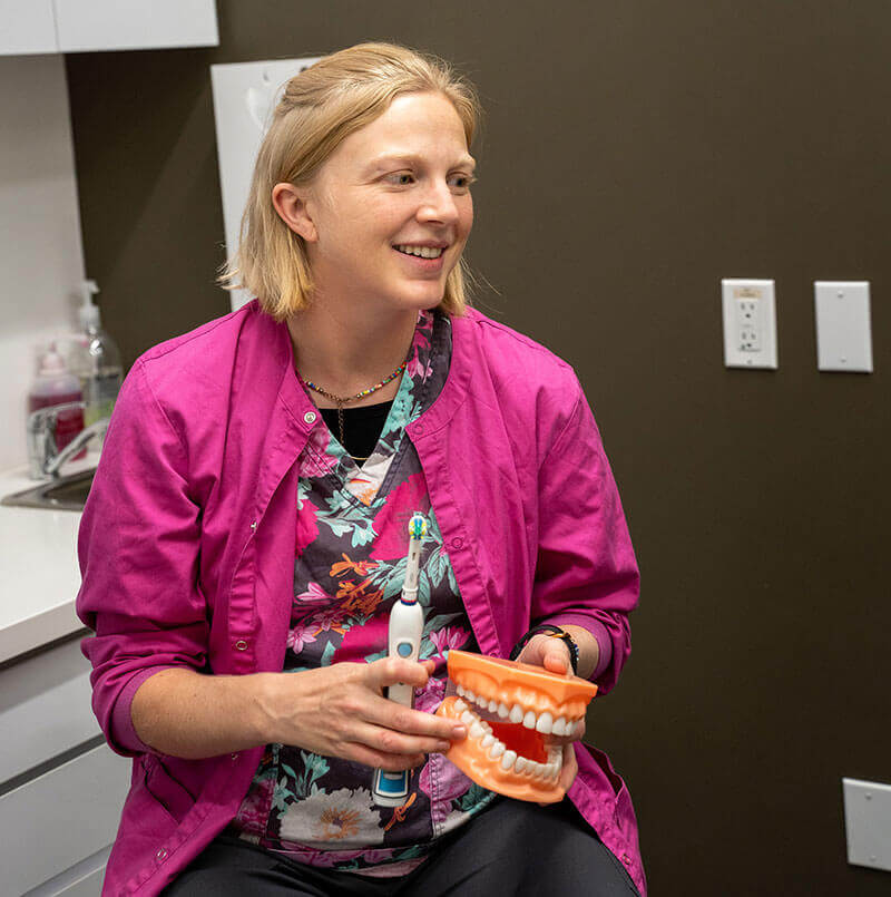 Dental Hygienist explaining the importance of dental hygiene